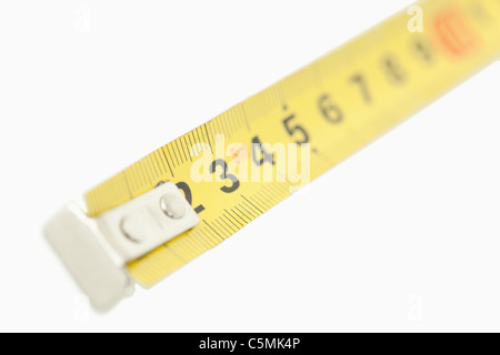 Camera focus on a yellow measuring tape Stock Photo