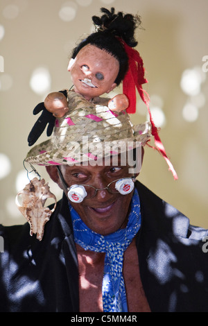 Cuba, Trinidad. Cuban Comedian Dancer at an Outdoor Cafe. Stock Photo