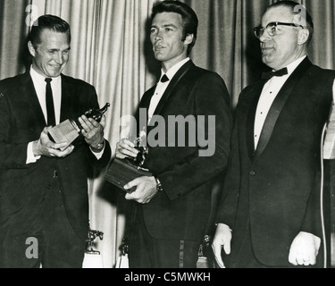 CLINT EASTWOOD with Eric Fleming at left receiving awards fo0r their 'Rawhide' TV series Stock Photo