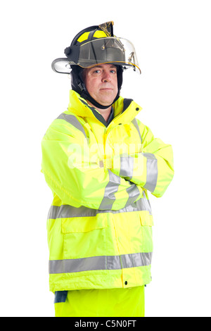Portrait of a serious firefighter, isolated on white background. Stock Photo