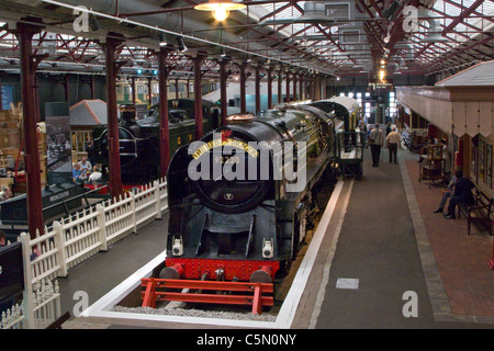 interior of Swindon railway museum (Steam) with evening star engine on victorian station platform, Swindon, Wiltshire, England. Stock Photo