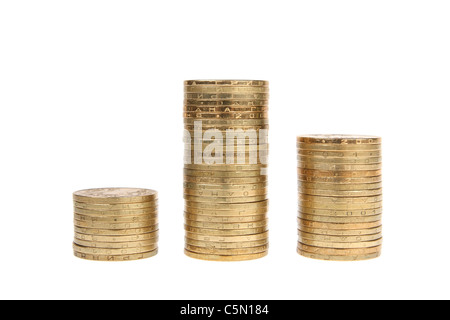 It shows the piles of coins on white background Stock Photo - Alamy