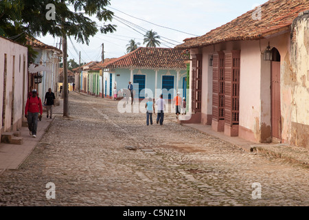 Cuba, Trinidad. Late Afternoon Street Scene. Man on Horseback. Stock Photo