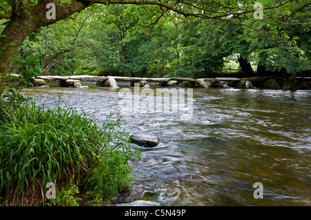 Tarr Steps a medieval clapper bridge across the River Barle near Withypool Exmoor National Park, Somerset, England. Stock Photo