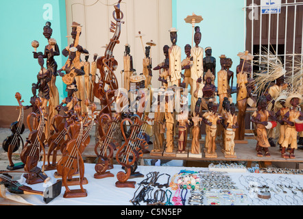 Cuba, Trinidad. Wood Carvings in Handicrafts Market. Stock Photo