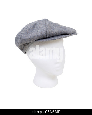 Wearing a masculine tweed flat driving cap worn on the head when out for a drive - path included Stock Photo