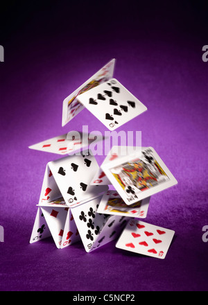 A house of cards falling down Stock Photo