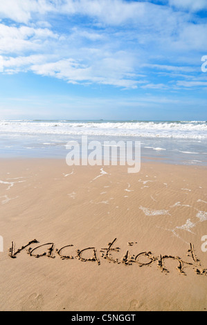 Spain written in the sand at the beach Stock Photo - Alamy