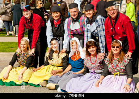 Dutch people posing in a group in ethnic dress in Holland, Michigan, USA. Stock Photo