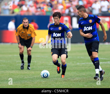 Manchester United mid-fielder, Park Ji-Sung (L) and Federicho Macheda, vs. the Chicago Fire, at Soldier Field. July 23, 2011 Stock Photo