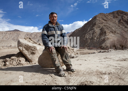 Tsewang Gelik (49) is a landowner in Igoo. 1.5 hectares of his land was destroyed in the floods. Stock Photo