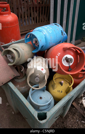 Gas cylinders ready for recycling in a scrapyard, uk Stock Photo