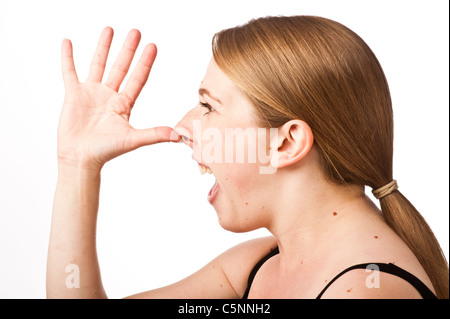 insulting gesture woman thumbing young caucasian making her hand nose alamy profile