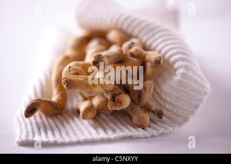 Grissini (bread sticks) with black olives Stock Photo