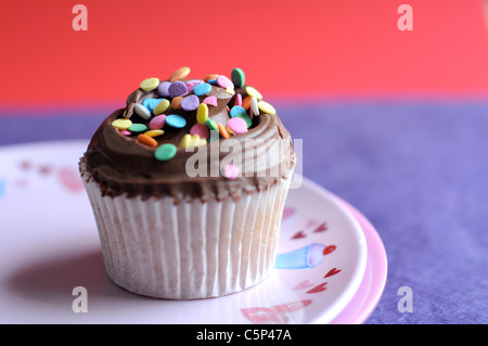 Chocolate cupcake with chocolate frosting Stock Photo