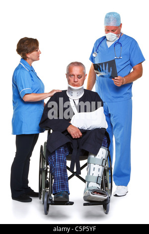 Photo of a doctor in scrubs examining an x-ray of the man in the wheelchairs hand Stock Photo