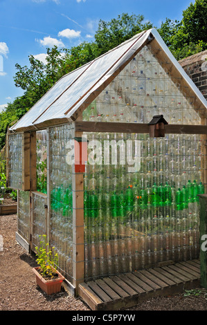 Recycled glasshouse made from used plastic bottles. See image C5PA5F for detail of the wall of this greenhouse Stock Photo