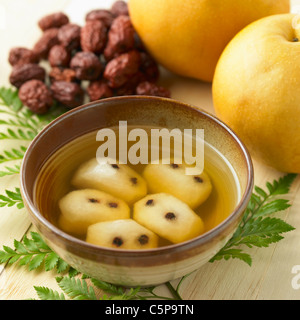 Boiled pear preserved in honey Stock Photo