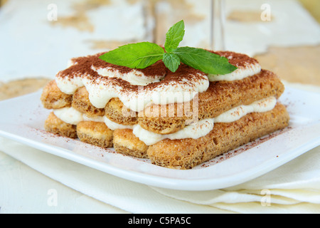 Traditional white Italian birthday cake with congratilations, buon  compleanno means happy birthday close up Stock Photo - Alamy