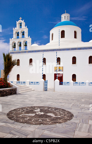 Marble paved courtyard below Greek Orthodox Church in Oia, Santorini the Cyclades Greece Stock Photo