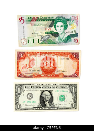 An Eastern Caribbean $5 note, a Central Bank of Trinidad and Tobago $1 note and a United States of America $1 note Stock Photo