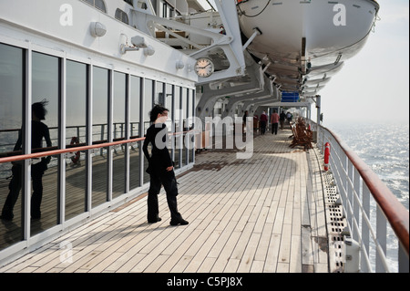 Passengers on Deck 7, Queen Mary 2 Ocean Liner. Stock Photo