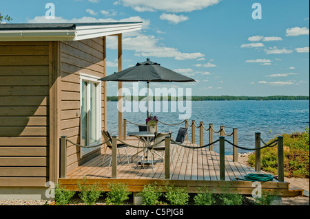 Traditional summer terrace of the Finnish cottage Stock Photo