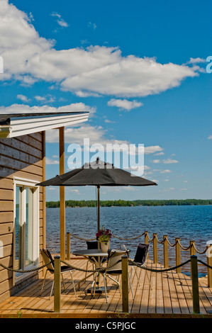 Traditional summer terrace of the Finnish cottage Stock Photo