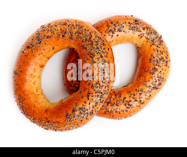 two bagels with poppy seeds isolated on white background Stock Photo