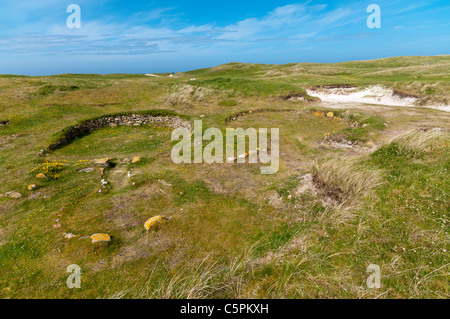 Cladh Hallan roundhouses on the island of South Uist in the Outer Hebrides. Stock Photo