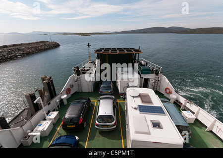 The Caledonian MacBrayne car ferry MV Loch Portain crossing the Sound of Harris between Berneray and Leverburgh. Stock Photo