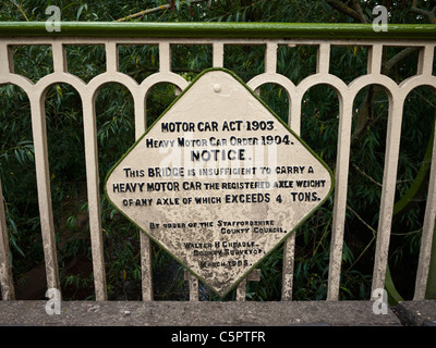 Old road sign from the Motor Car Act 1903 on a road bridge in the South Staffordshire village of Trysull Stock Photo