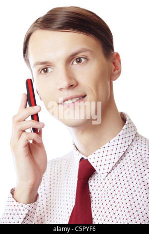 Smiling businessman talking via cell phone on a white background Stock Photo