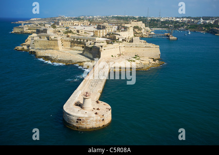 Entrance to the Harbour and view towards Fort Ricasoli Valletta Malta Stock Photo