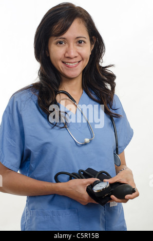 Attractive asian filipino nurse doctor healthcare worker Stock Photo
