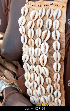 Detail of a traditional decorated goatskin worn by the Hamer tribeswomen in the Lower Omo Valley, Southern Ethiopia, Africa. Stock Photo