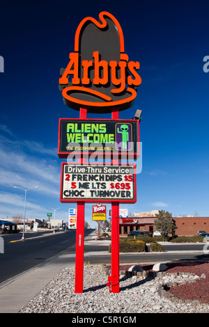 Arby's sign with Aliens Welcome display, Roswell, New Mexico, United States of America Stock Photo