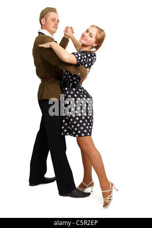 Dancing couple dressed in 60s isolated on white background Stock Photo
