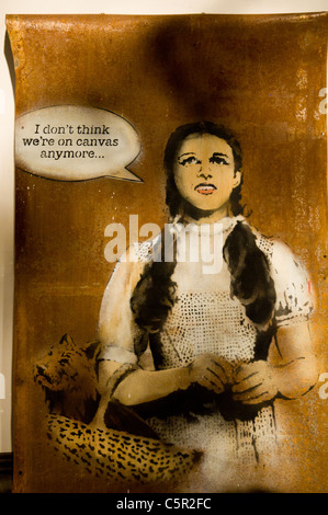 Banksy picture of Judy Garland as Dorothy Gale from The Wizard of Oz on metal sheet 'I don't think we're on canvas anymore...' Stock Photo