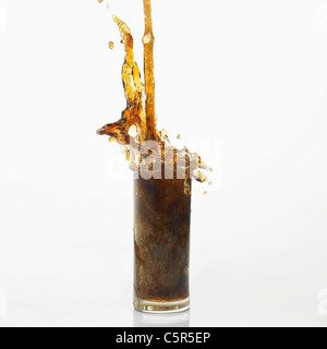 Coke pouring down to a glass Stock Photo