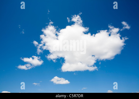 white cumulus clouds against blue sky