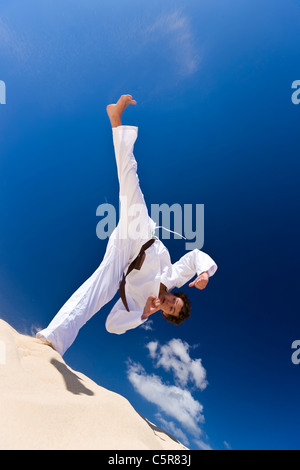 Martial Artist high kick. Stock Photo