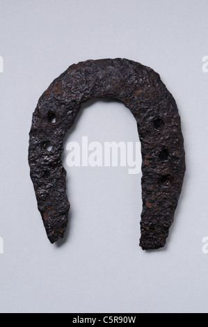 Iron horseshoe . Height 120 mm Thickness 4 mm. ( 4th- 8th CE ) - Roman period in Complutum . SPAIN Stock Photo