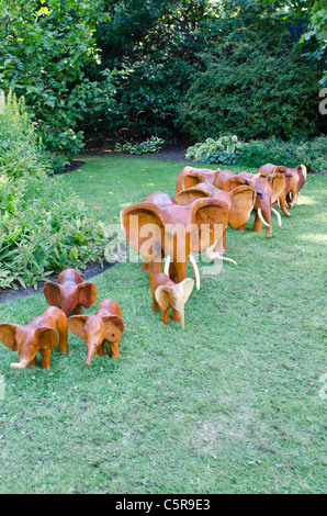 Wooden elephants Clarence House garden The Mall Westminster London Uk Stock Photo