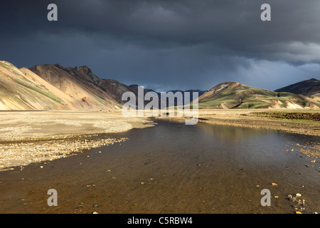 Storm Clouds over the Barmur Rhyolite Mountains and the River Jokulgilskvisl at Landmannalaugar in the Fjallabak Area of Iceland Stock Photo