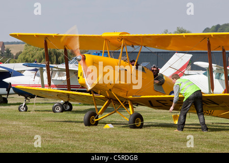 DH82 Tiger Moth biplane ready for take-off. Netherthorpe aerodrome, UK Stock Photo