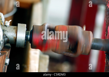 Spinning Universal Joint on shaft Stock Photo