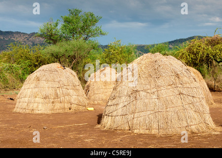 A traditional Mursi tribal village in Mago National Park in the Lower Omo Valley, Southern Ethiopia, Africa. Stock Photo