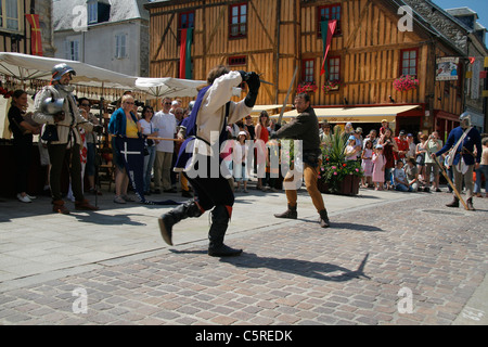 Medieval festival in Domfront, sword fighting (Orne, Normandy, France). Stock Photo