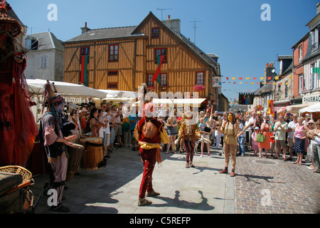 Medieval festival in Domfront, jugglers in the street (Orne, Normandy, France). Stock Photo
